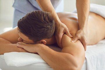 therapist massaging neck